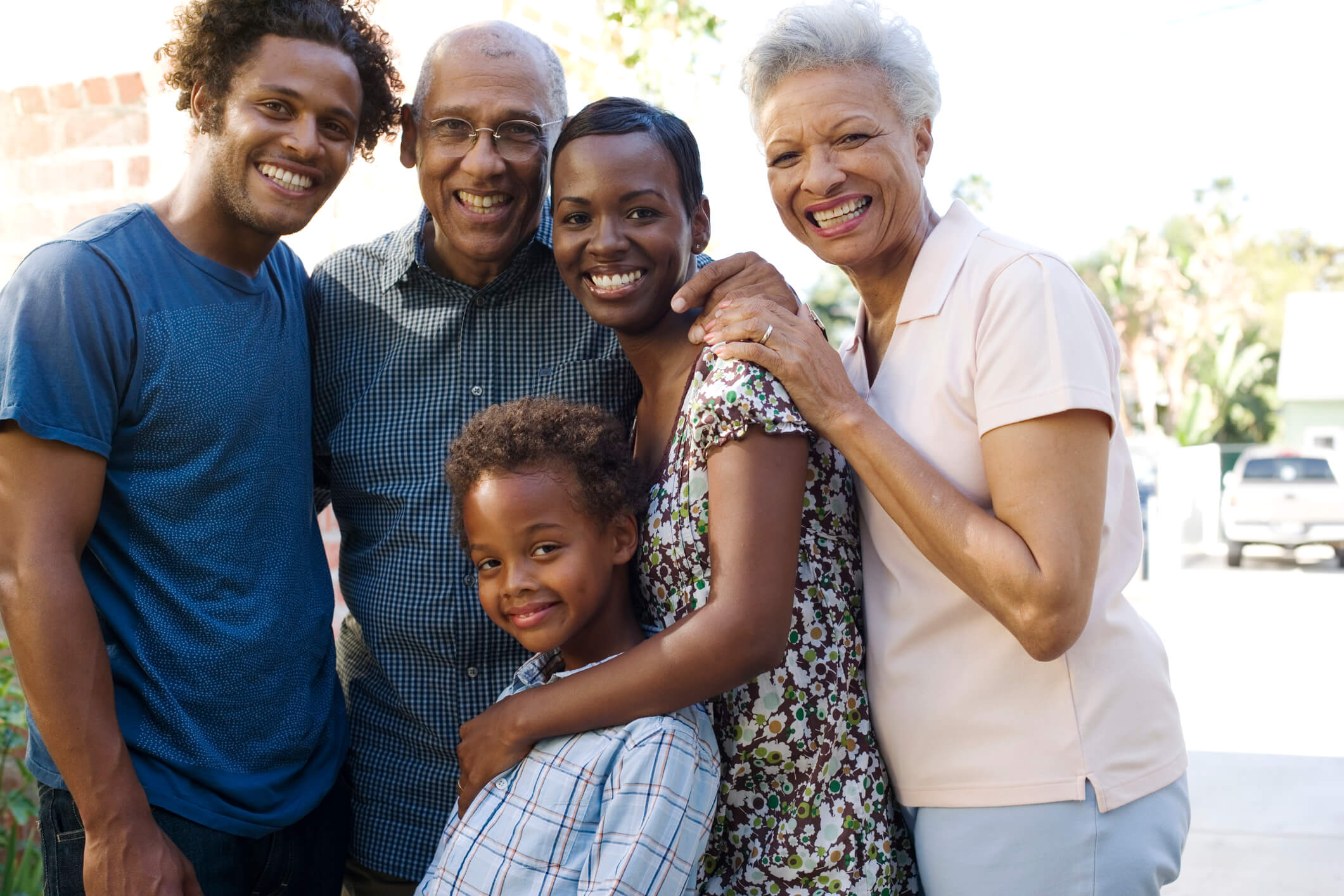 multi generational family smiling together